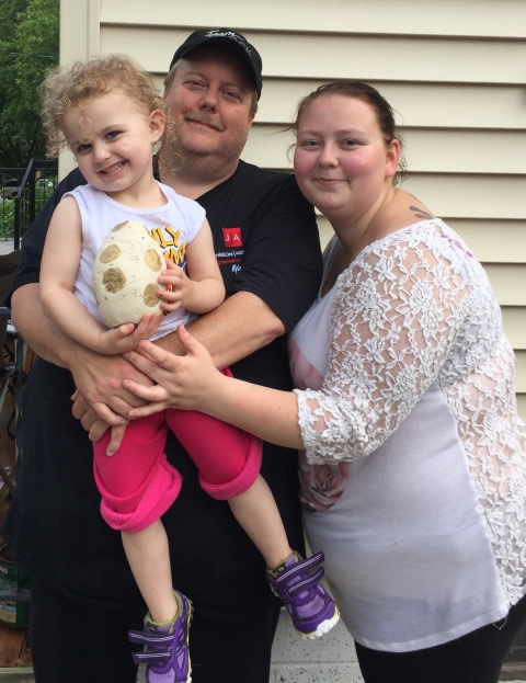 2015 Medallion Hunt winners Kyle Thompson, Cassi Brand, and Cece Brand, posed with the hidden egg.