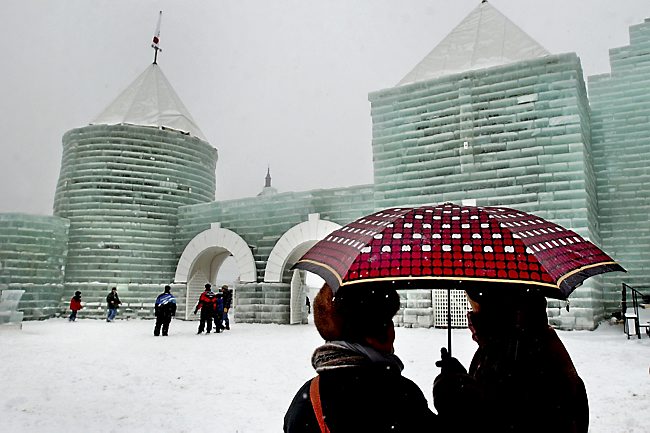 Japanese tourists, traveling on a tour organized by Global Youth Bureau based out of Tokyo, visit the St. Paul Winter Carnival ice castle on Jan. 26, 2004. (Pioneer Press File)