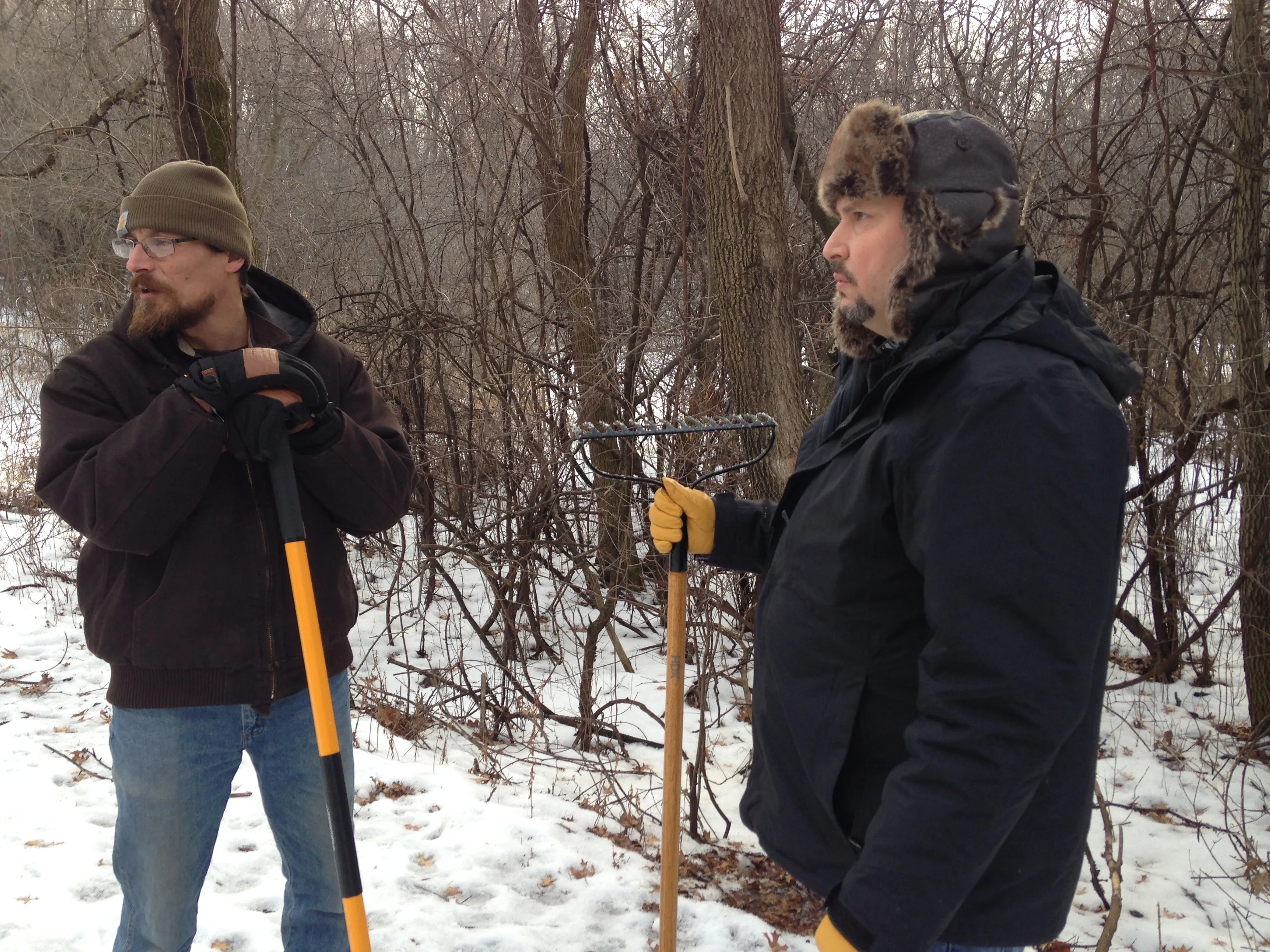 Ed Brodei, left, and Randal Simmons discuss strategy Monday, Feb. 1, 2016, before looking for the Pioneer Press Treasure Hunt medallion at Battle Creek Regional Park. (Pioneer Press: Jaime DeLage) 