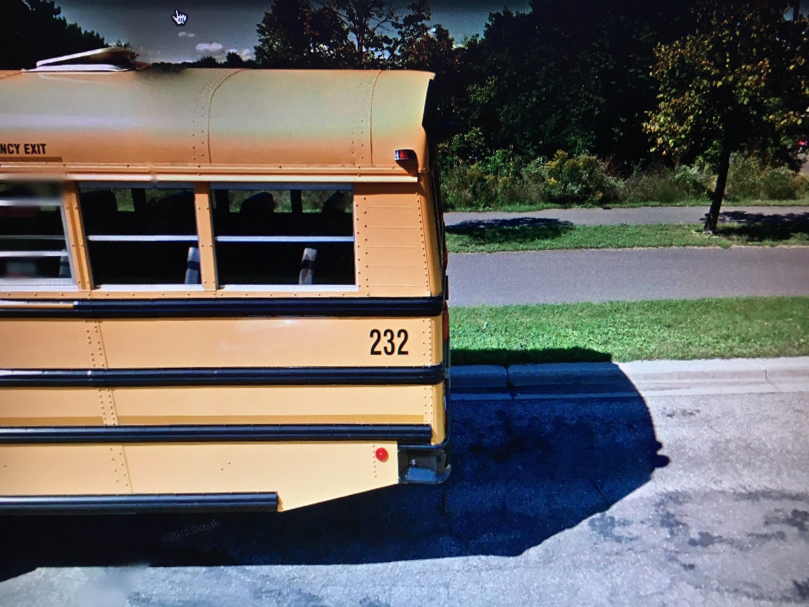 A screenshot of Google street view, in front of Harriet Island Regional Park in St. Paul. The bus bears the number 232, referenced in Clue 5. (Courtesy of Google)