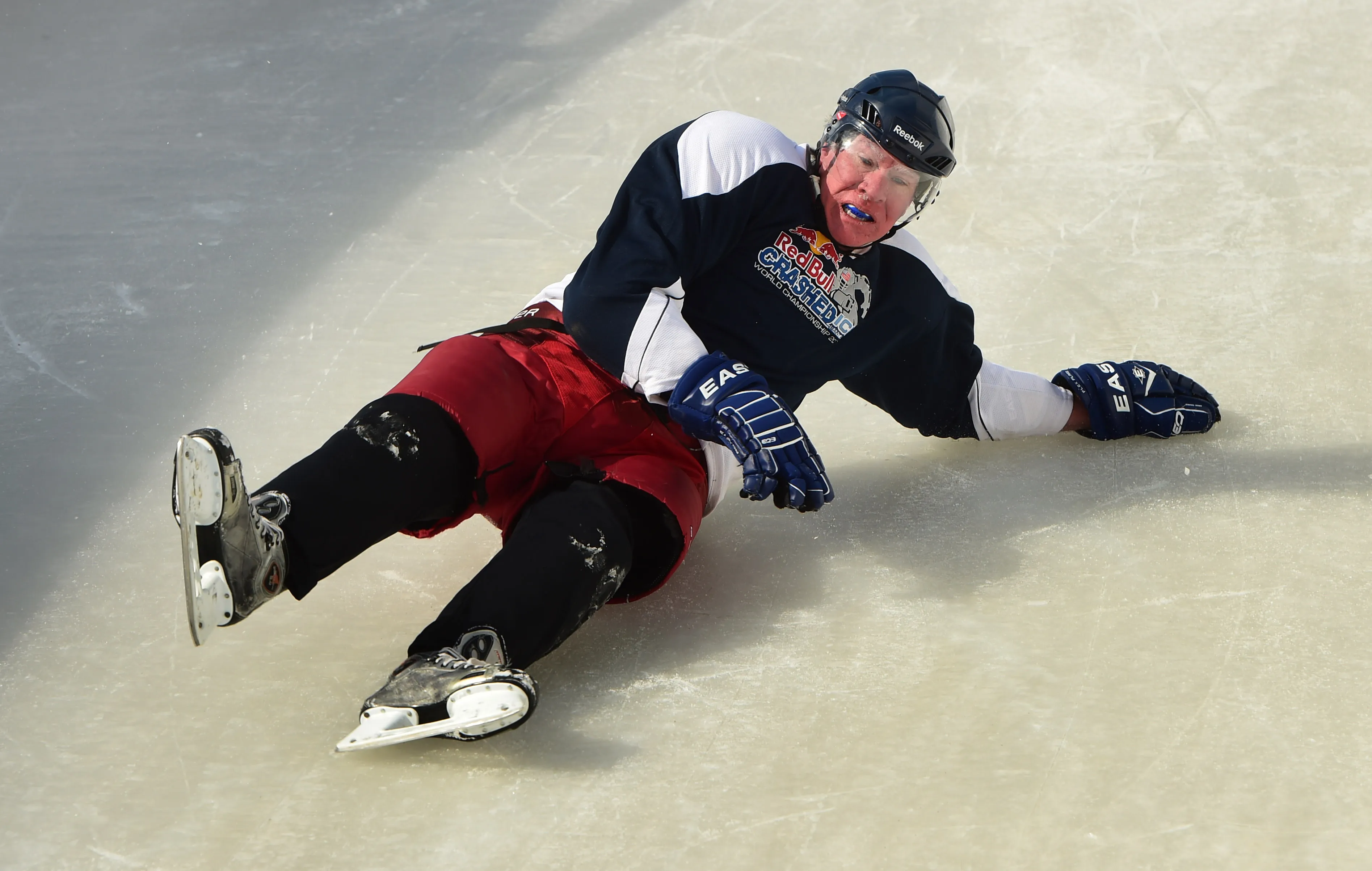 St. Paul Mayor Chris Coleman crashes to the ice as he tries out his skating abilities on the Red Bull Crashed Ice course in St. Paul, Thursday, Feb. 2, 2017. Today was the final time Coleman will be on the course as mayor. He has tried out sections of the course each year since Red Bull held its first Crashed Ice event in Saint Paul in 2012. The 340-meter long course drops 35 vertical meters and begins in front of the Cathedral of St. Paul. (Pioneer Press: Scott Takushi)
