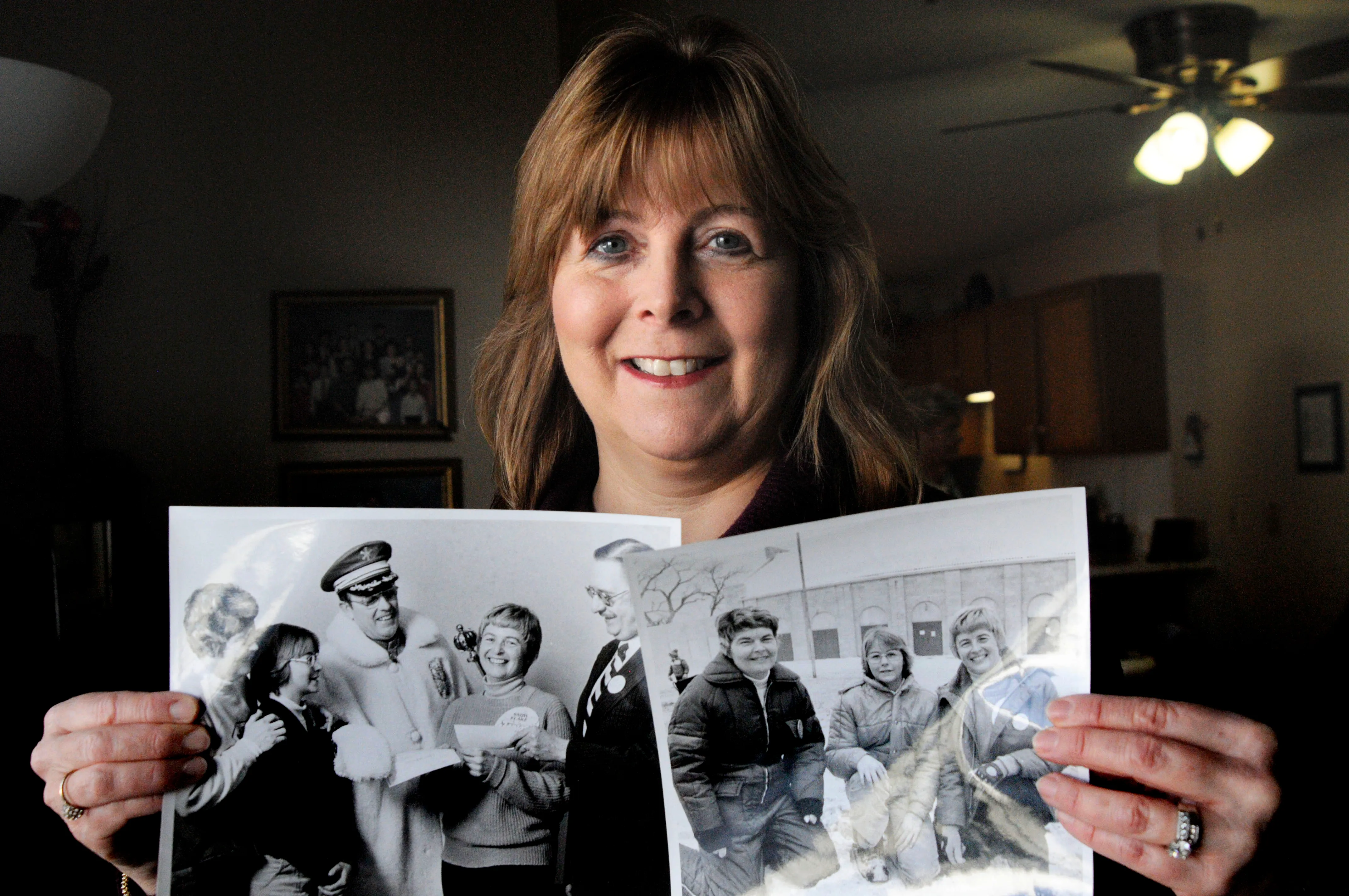 Diane Houle holds the front-page story the Pioneer Press ran after she, her mother and her mother's good friend found the Treasure Hunt medallion in 1978, when Houle was 12. "We were pretty seasoned hunters," she said, "so it made finding it that much more incredible." Houle, of Woodbury, is pictured on Tuesday, Jan. 23, 2017, in Maplewood. (Lisa Legge / Pioneer Press)
