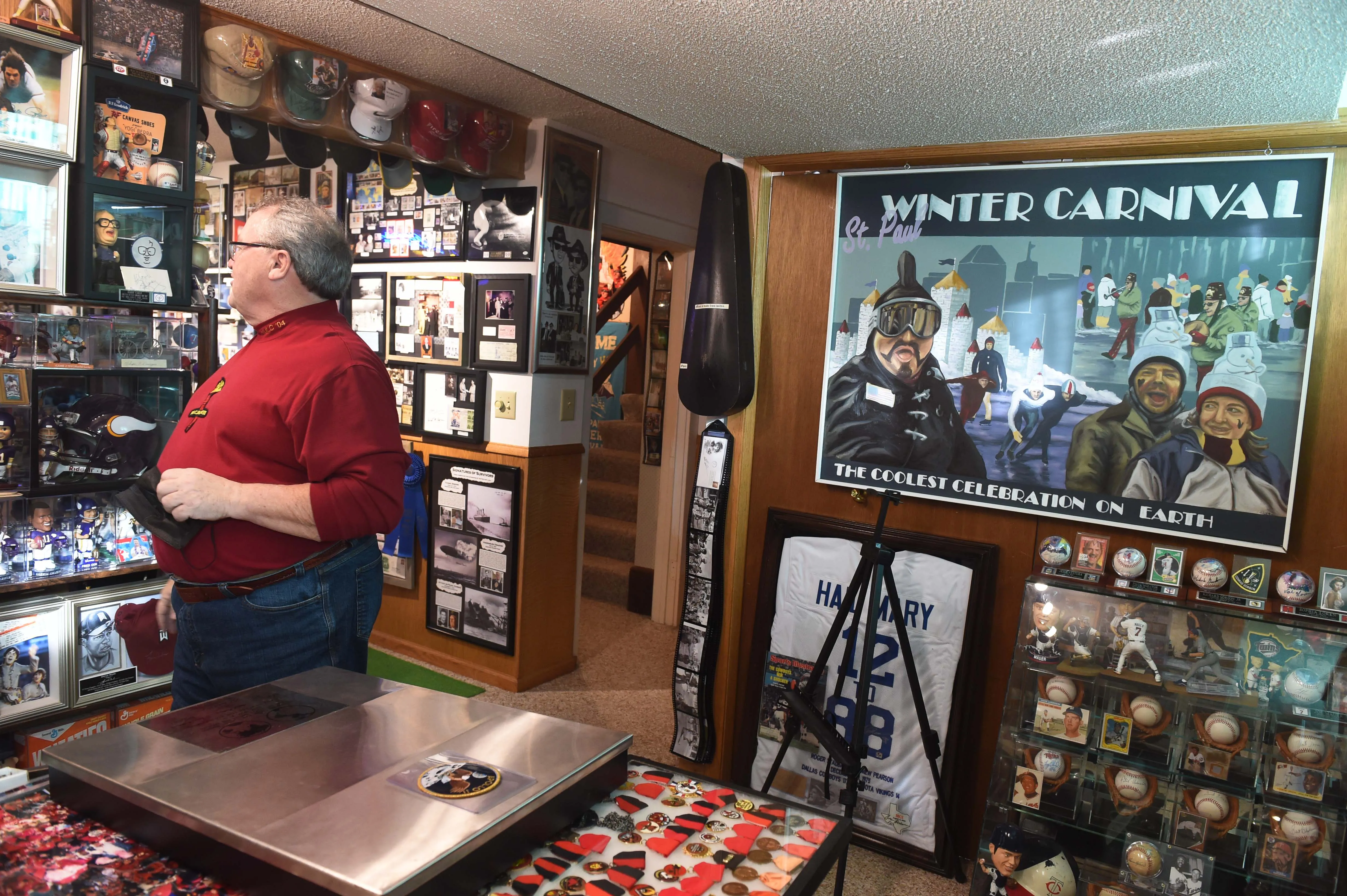 Tom Barrett shows off some of his Winter Carnvial memorabilia