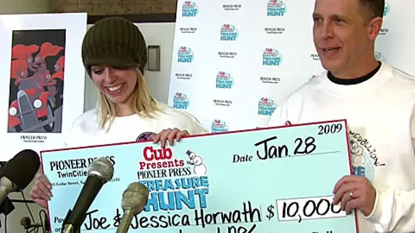 Joe Horwath, and daughter Jessica Horwath, both of Maplewood, at the St. Paul Pioneer Press building after confirming they are the winners of the 2009 Treasure Hunt on Jan. 28, 2009. (Pioneer Press: Jeremy Olson)