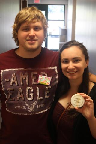 Matthew Koskie and Ashley Wilson discovered the 2012 Woodbury Days medallion.