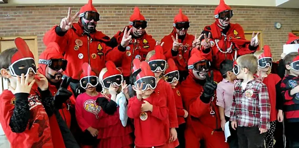 Pre-schoolers pose with the Vulcan Krewe as John Brewer imitated a Vulcan for a first-person piece on the Vulcans and the Winter Carnival at Summit Ave Preschool in St. Paul Tuesday afternoon January 29, 2013. (Pioneer Press: John Doman)