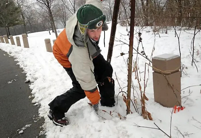 First-time treasure hunter Matt Foster searches Sunday, Jan. 24, 2016, at Indian Mounds Regional Park in St. Paul. (Pioneer Press: Jaime DeLage)