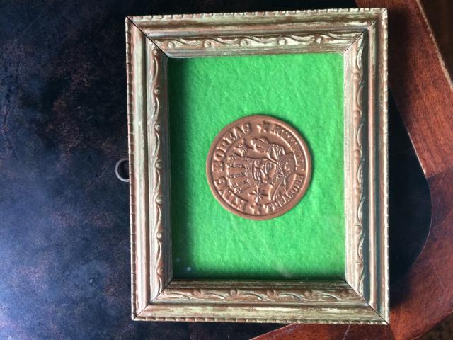 The 1977 Medallion in a frame