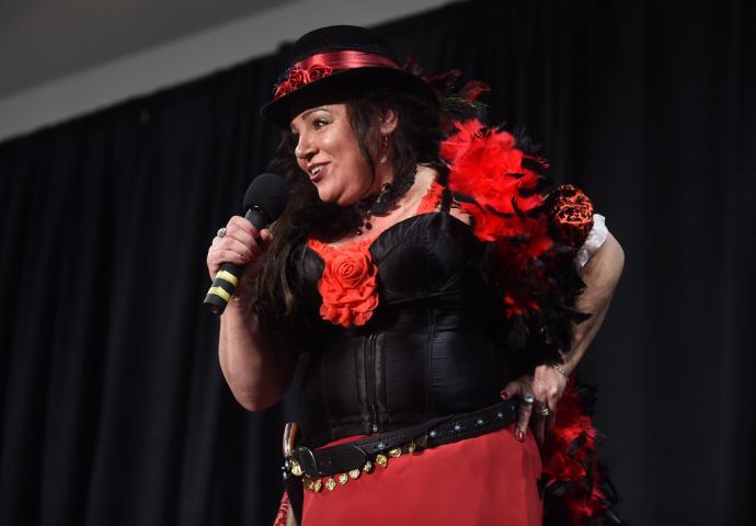 Christine Christofore of Little Canada sings a bawdy song as the Winter Carnival's Klondike Kate competition was held at the Prom Center in Oakdale, Wednesday night, January 13, 2016. (Pioneer Press: Scott Takushi)