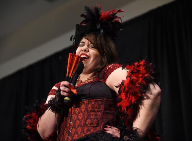 Amy Hopkins of Baldwin Wisconsin sings a bawdy song as the Winter Carnival's Klondike Kate competition was held at the Prom Center in Oakdale, Wednesday night, January 13, 2016. (Pioneer Press: Scott Takushi)