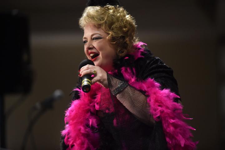Kristen Coulthard of West St. Paul works the judges as the Winter Carnival's Klondike Kate competition was held at the Prom Center in Oakdale, Wednesday night, January 13, 2016. (Pioneer Press: Scott Takushi)