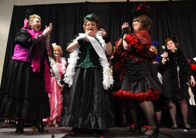 Theresa McConnon of St. Paul , center, is crowned the winner of the Winter Carnival's Klondike Kate competition held at the Prom Center in Oakdale, Wednesday night, January 13, 2016. From left: Kristen Coulthard of West St. Paul, McConnon, and Amy Hopkins of Baldwin, Wisconsin.(Pioneer Press: Scott Takushi)