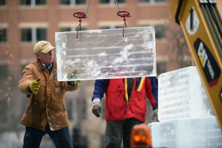 helps build the mini ice palace in Rice Park in downtown St. Paul, Sunday, January 24, 2016. (Pioneer Press: Scott Takushi)