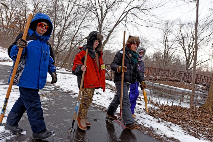 Rebecca Gibson and her triplets, from left, Maxwell, Ben and Audrey, march along a path in Keller Regional park in Maplewood, Minn., in search of the medallion in the annual Pioneer Press Treasure Hunt Monday, Jan. 30, 2017. (Pioneer Press: Dave Orrick)
