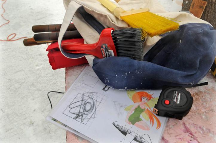 Tools and sketches sit on a table in Rice Park as ice sculptors take a lunch break.  (Pioneer Press: Jean Pieri)
