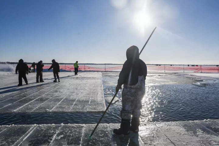 Ice floats in Green Lake waiting to be removed by harvesters Wednesday in Spicer. (Erica Dischino / Forum News Service)