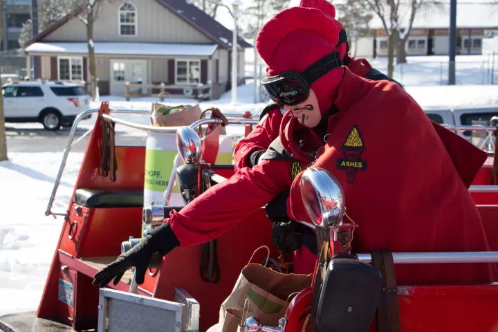 A group of 15-20 people helped to pack donated food into five firetrucks Feb. 23. (Callie Schmidt / Pioneer Press)