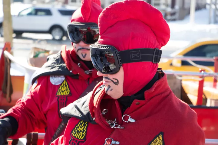 The St. Paul Vulcans suited up to pack 2 tons of food into five firetrucks to deliver on Feb. 23. (Callie Schmidt / Pioneer Press)