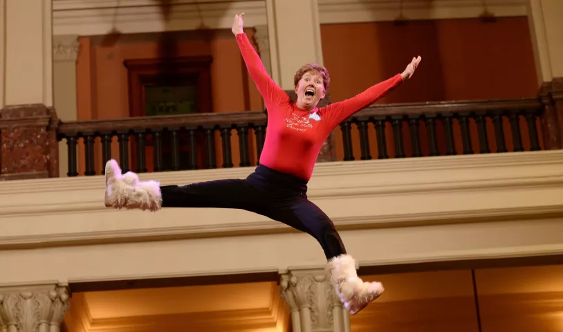 62 year-old Bouncing Girl candidate Pat Dechane from Plymouth clearly enjoys being bounced during the St. Paul Bouncing Team tryouts at the Landmark Center in St. Paul on Friday, February 5, 2016. (Pioneer Press: John Autey)