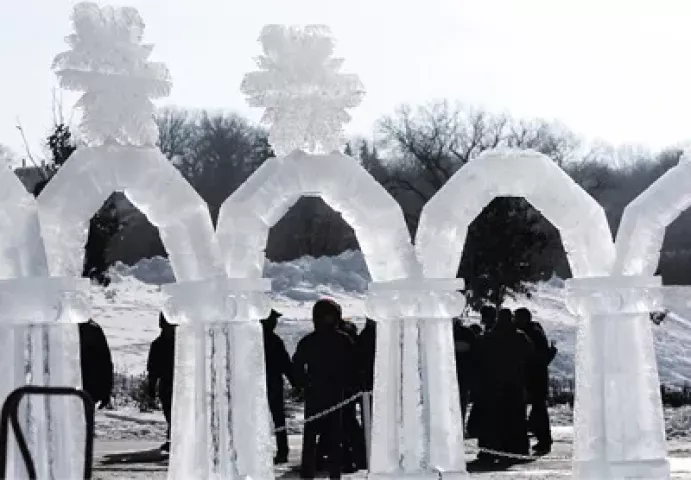 One by one, the snowflakes atop the ice arches leading to the ice sculptures at the 2007 St. Paul Winter Carnival on Harriet Island melted and fell to the ground. For the past three years, many carvings have melted early during stretches of unseasonably high temperatures. The unpredictable weather and lackluster economy have threatened the ice sculptures for next year's carnival.