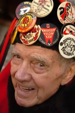 1946 Vulcan Krewe member Dick O'Brien and his 1946 Vulcan cap covered with vintage Vulcan and Winter Carnival buttons-- in front of his St. Paul home, Thursday afternoon January 10, 2008. (JOHN DOMAN, Pioneer Press)