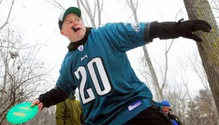 Rich Snyder of Minneapolis makes a drive during a game of disc golf with friends at Acorn Park in Roseville on Sunday, January 11, 2008. More than 50 disc golf players gathered at Acorn Park in Roseville for the fifth annual Fairway Freezer Ice Bowl, an event that raises money for a local human services agency. "It's nothing but fun out here today," said Snyder. (Ben Garvin: Pioneer Press)