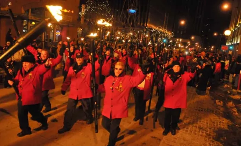jea tourchlight parade 03 Past Vulcan Krewes accompany Vulcanus Rex to the Landmark Center in order to overthrow King Boreas at the end of the 2010 St. Paul Winter Carnival, January 29, 2010.