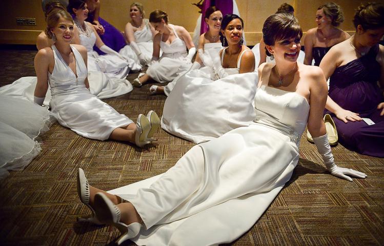 Candidates for the 2014 Queen of the Snows wait to be introduced, including Laura Werk of Anoka, right, at the 128th St. Paul Winter Carnival Royal Coronation Friday, January 24, 2014. (Pioneer Press: Ben Garvin)