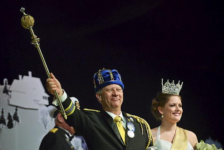 Roger C. Kruse of Anoka, this year's King Boreas LXXVIII, salutes the crowd with the new 2014 Queen of the Snows Abby Hoglin of Lakeville at the 128th St. Paul Winter Carnival Royal Coronation on Friday, January 24, 2014. (Pioneer Press: Ben Garvin)