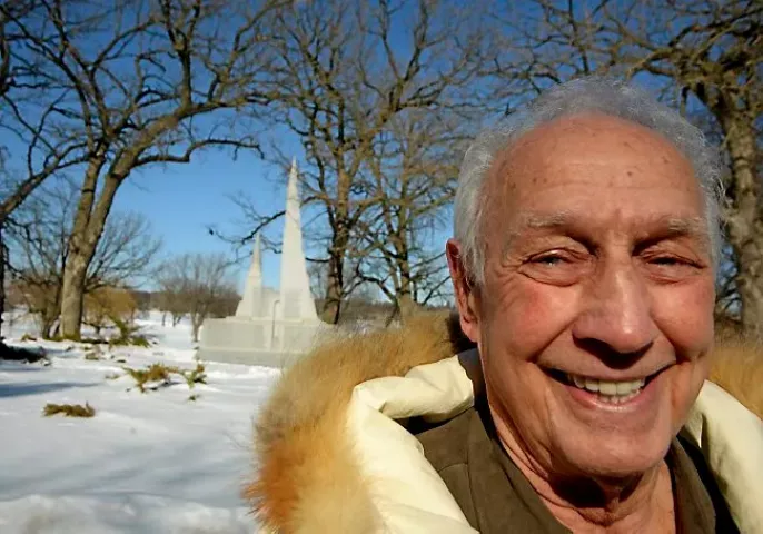 Charlie Hall stands in front of the 14 foot tall memorial to the workers and and sponsors of the 1986 Winter Carnival Ice Palace, which he wants moved from Phalen Park to Kellogg Boulevard, Saturday afternoon, March 8, 2014. In its current location very few people can admire it. Mr. Hall has even offered to pay for the move, just as he paid for the monument itself. (Pioneer Press: John Autey)