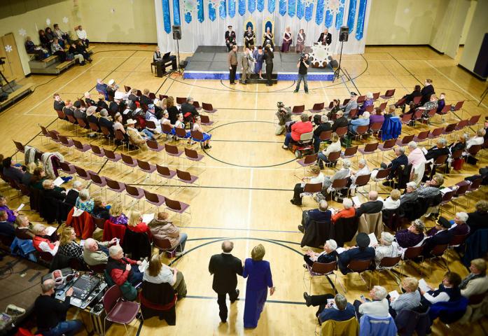 Candidates for the Senior Royalty Coronation enter the auditorium at the Paul and Sheila Wellstone Center at the start of the ceremony. (Pioneer Press: Ben Garvin)