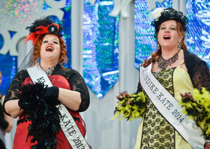 The 2014 Klondike Kate, Kathy Rustin-Westphal of St. Paul Park, right, serenades the audience with outgoing Klondike Kate, Anita Mack of St. Paul, during the Senior Royalty Coronation ceremony. (Pioneer Press: Ben Garvin)