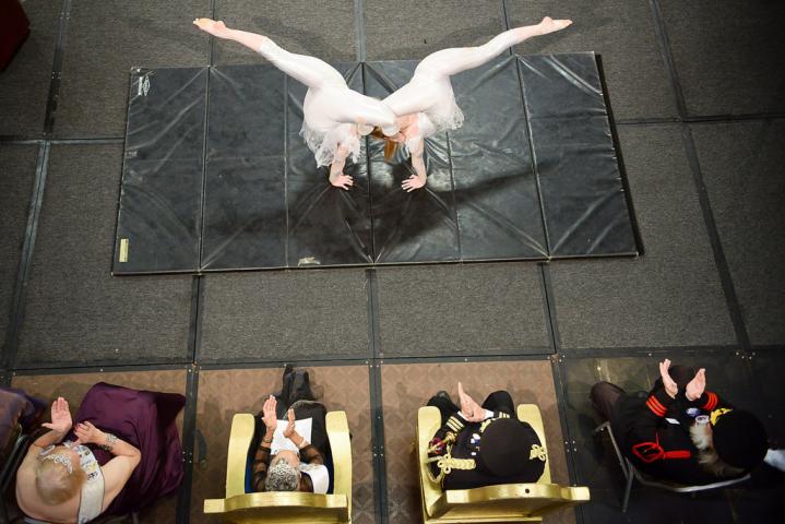 Libbi Ulm, 18, of White Bear Lake, right, and Jenna Ober, 15, of Minneapolis, both with Circus Juventas, undulate together during the the Senior Royalty Coronation ceremony. (Pioneer Press: Ben Garvin)