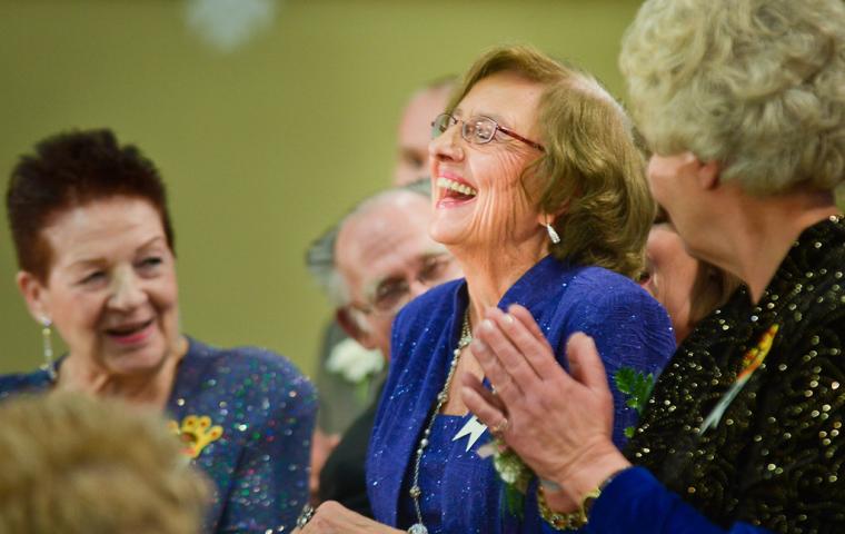 Gerry Schulz, center, reacts after she was revealed as this year's Queen of the Northlands during the Senior Royalty Coronation ceremony. (Pioneer Press: Ben Garvin)