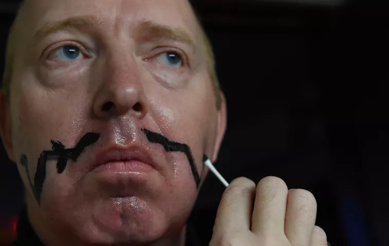 Doug Johnson, Grand Duke Fertilious, first puts Vaseline on his face, then makeup. He said that the Vaseline protects his face from the cold weather and also makes it easier to clean off his face at the end of the day. (Pioneer Press: Jean Pieri)