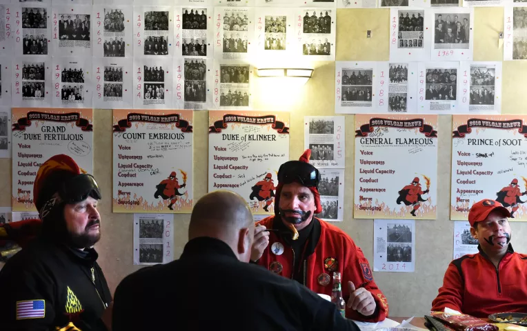 The Vulcans eat breakfast in the "den," which has a wall covered with photos of past Vulcans. (Pioneer Press: Jean Pieri)