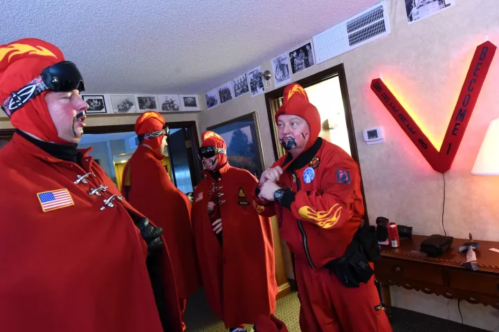 Randy Graff, Duke of Klinker, left, talks with John Hoeft, General Flameous, right, before the Vulcans leave their "den." (Pioneer Press: Jean Pieri)