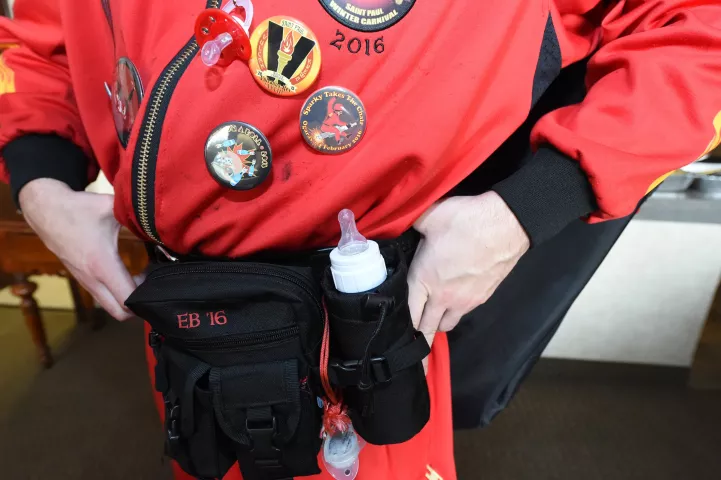 Being the youngest of the Vulcan Krewe, Mitch Haglin, Count Embrious, travels with a baby bottle and pacifier. (Pioneer Press: Jean Pieri)