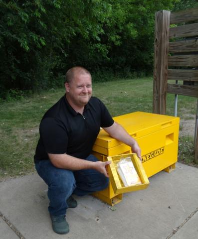 Jon Jackson, an Oakdale resident, found the Summerfest medallion underneath a lock box in Horseshoe Park.