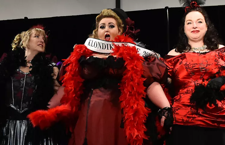 Natalia Hemingway, of St. Louis Park, Minn. reacts as she named the 2018 Klondike Kate for the St. Paul Winter Carnival at the Envision Event Center in Oakdale on Wednesday, Jan. 10, 2018. To her left is Sheryl Wiillams of Welch Township, and to her right is Shelley Pabst of South St. Paul, both contestants made it to the final round. Hemingway, a first year contestant, was encouraged to enter the contest by co-workers who insisted that she would be perfect for the role of Klondike Kate. Wowing the audience