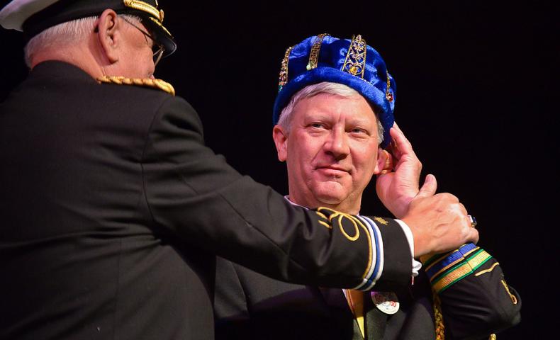 Roger C. Kruse of Anoka, this year's King Boreas LXXVIII, right, is crowned by the 2013 King Boreas Ted Natus of St. Paul. (Pioneer Press: Ben Garvin)