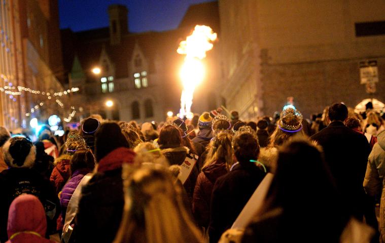 Marchers head up Sixth Street toward Rice Park during the St. Paul Winter Carnival Moon Glow Parade in St. Paul on Thursday, January 28, 2016. (Pioneer Press: John Autey)