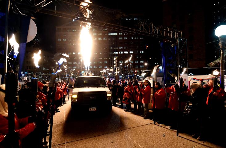 A van with a hot air balloon gondola enters Rice Park at the head of the St. Paul Winter Carnival Moon Glow Parade in St. Paul on Thursday, January 28, 2016. (Pioneer Press: John Autey)