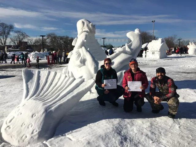 Team Dino Fight won the 2016 St. Paul Winter Carnival snow-sculpting competition with its creation “Attack of the Hookjaw.”