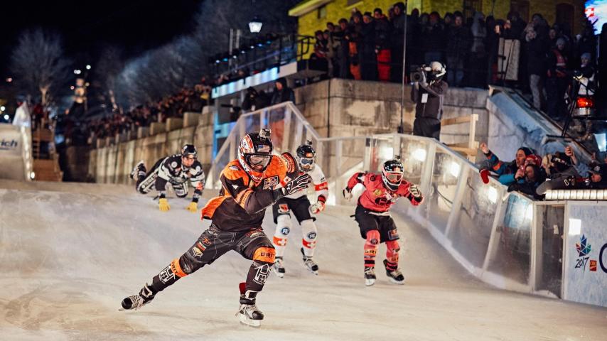 Lakeville native Cameron Naasz leads in the final heat ahead of Dean Moriarity of Canada (right), Jim DePaoli of Switzerland (middle back) and Scott Croxall of Canada at the eighth stage of the Ice Cross Downhill World Championship at the Red Bull Crashed Ice race in Ottawa, Canada on March 4, 2017. (courtesy photo)