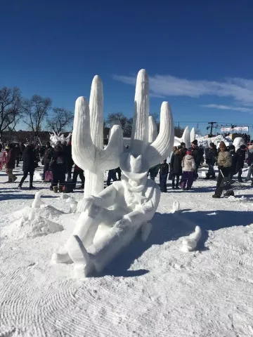The Second Place winner in the Snow Sculpting Competition, "Under A Rest" by Shadow Men" also won the People's Choice Award. Team members were: Tim Trost of Goodhue), Jim Krueger of (East Bethel and Jared Trost of Hastings. (photo courtesy Saint Paul Winter Carnival)