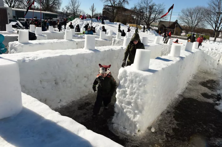 The snow maze offers a challenge for pint- size participants at the Snow Park at the Minnesota State Fairgrounds in Falcon Heights, part of the 2017 St. Paul Winter Carnival's events, Sunday, January 29, 2017. (Pioneer Press: Scott Takushi)