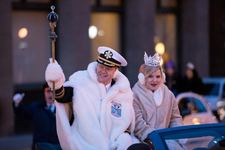 King Boreas Rex -- Jason Bradshaw -- and Aurora, Queen of the Snows -- Lindsey Jo Sandoval -- are driven through downtown St. Paul on Saturday, Feb. 4, 2017, during Winter Carnival Vulcan Victory Torchlight Parade. (Pioneer Press: Andy Rathbun)