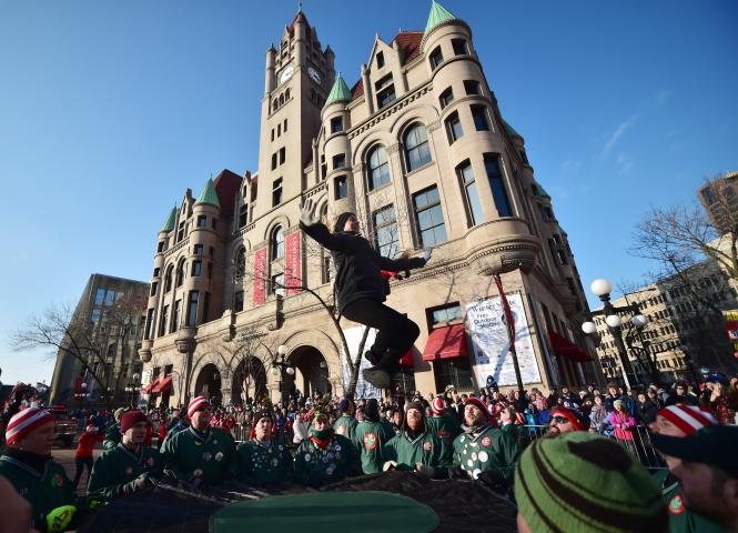 Heather Klosterman, a 2017 St. Paul Bouncing Team member, is tossed into the air. Tryouts for the 2018 bouncing team will be held Friday, Feb. 9, from 6-9 p.m. at Landmark Center in St. Paul. Those selected will participate in the Vulcan Victory parade on Feb. 10. (John Autey / Pioneer Press)