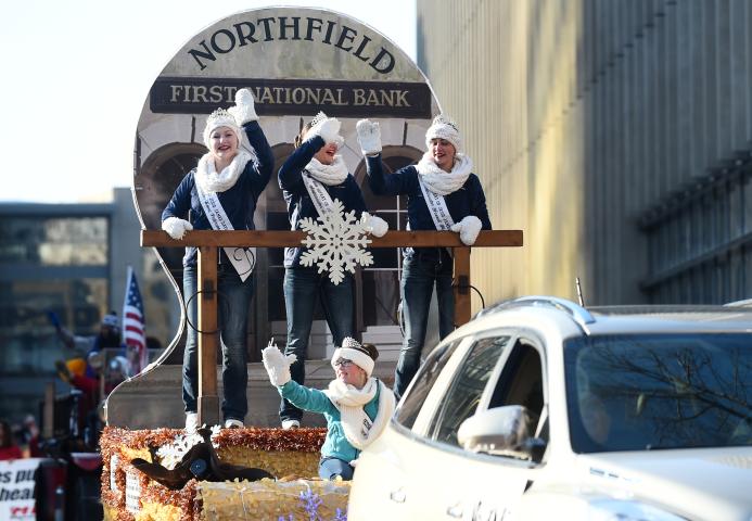 The Defeat of Jesse James Days Ambassadors wave from atop their float. (John Autey / Pioneer Press)